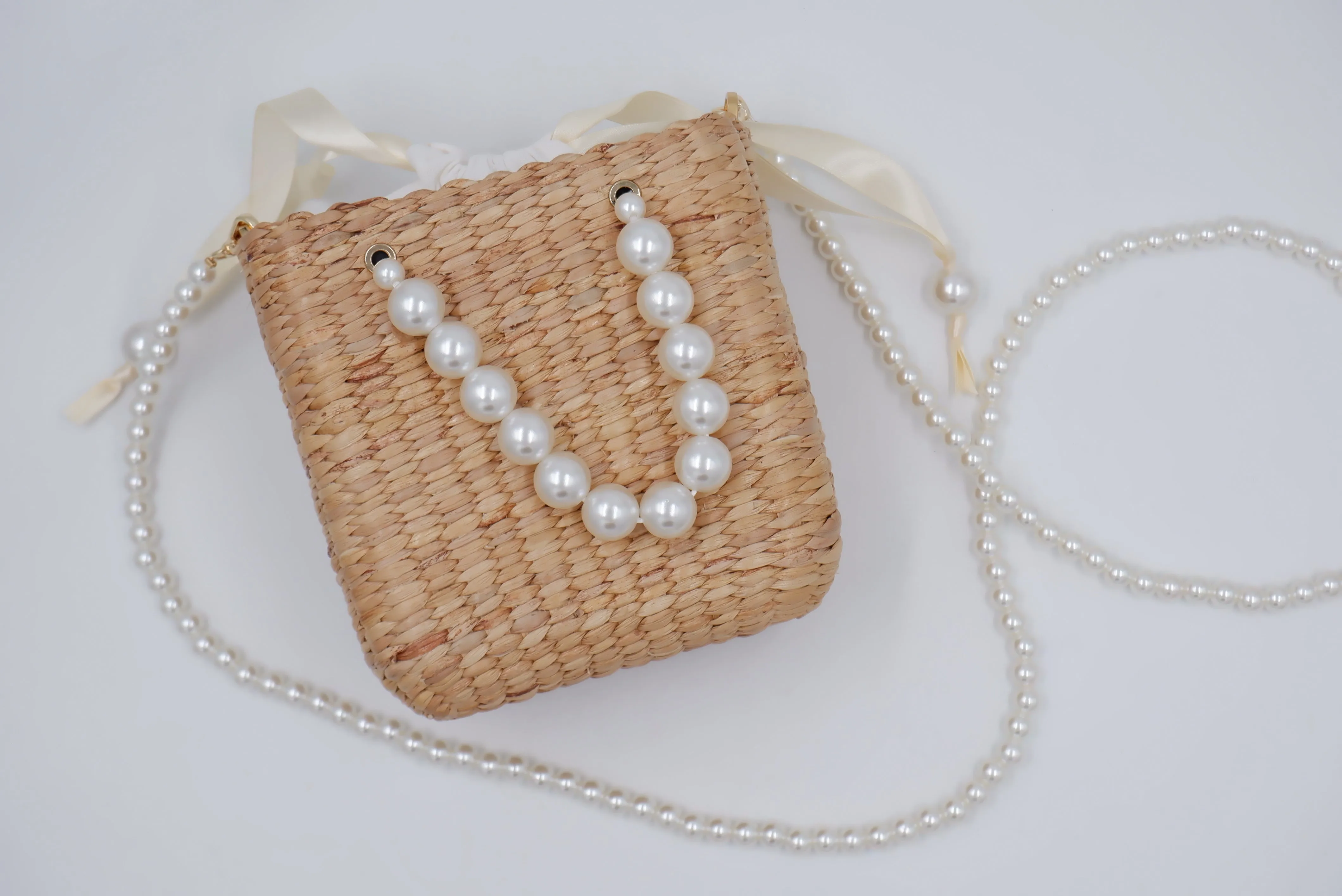 pearl beaded straw bag