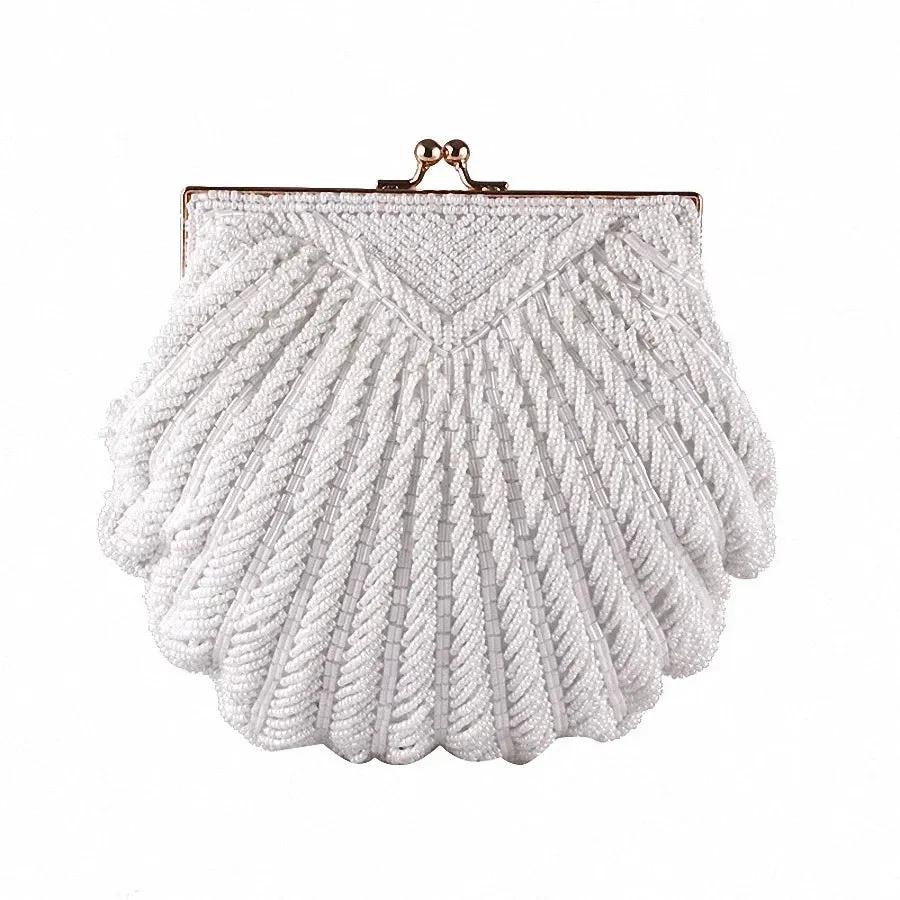 Women's Clutch Bag: Elegant evening clutch bags for weddings. Featuring a bridal handbag adorned with pearl beads.
